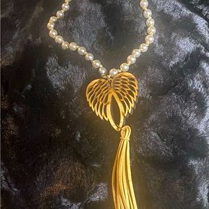 Nice necklace with wooden wings